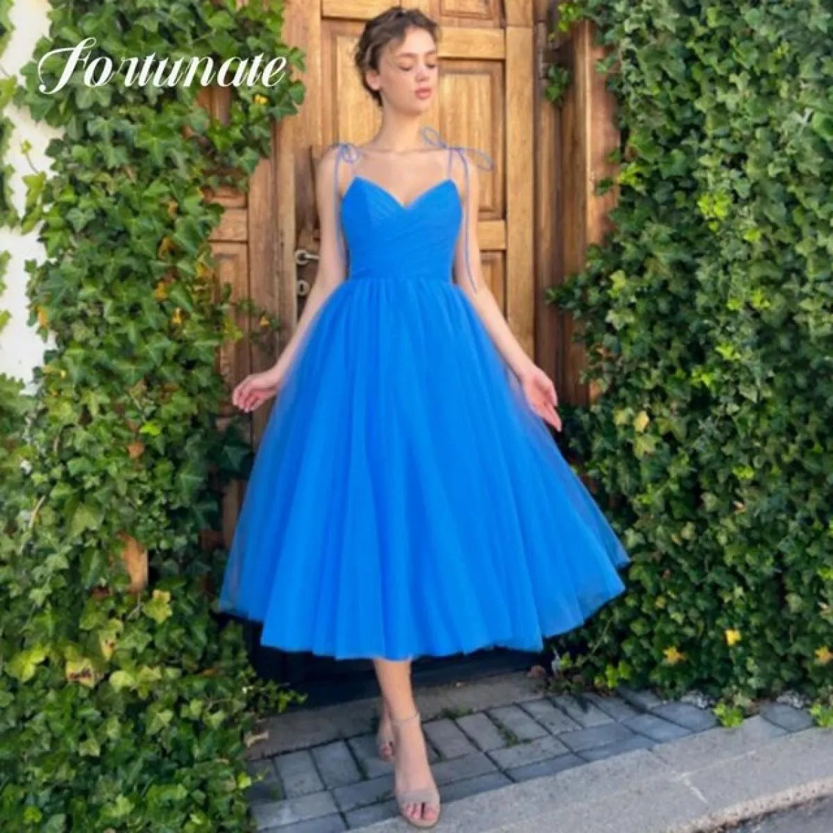 Elegante abito Quinceanera corto blu mare Una linea senza maniche senza spalline Abito da cocktail party serale per donna