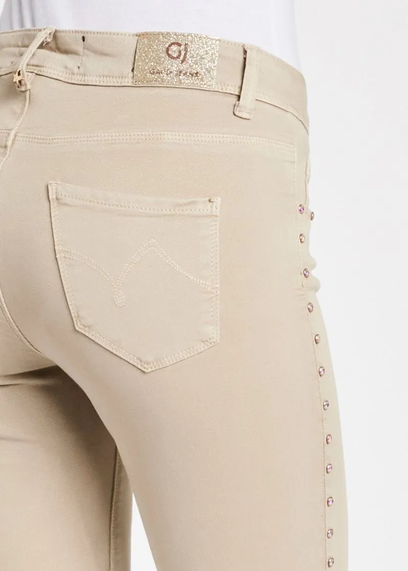 Pantaloni skinny con borchie