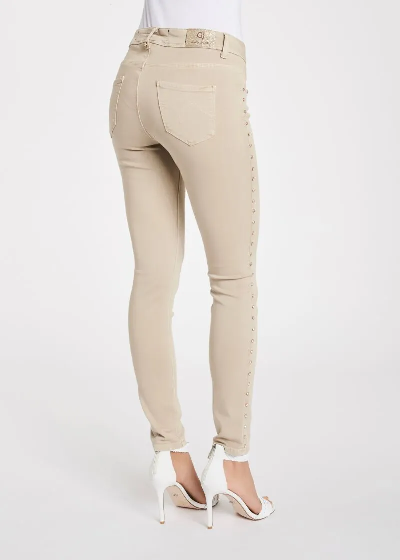 Pantaloni skinny con borchie