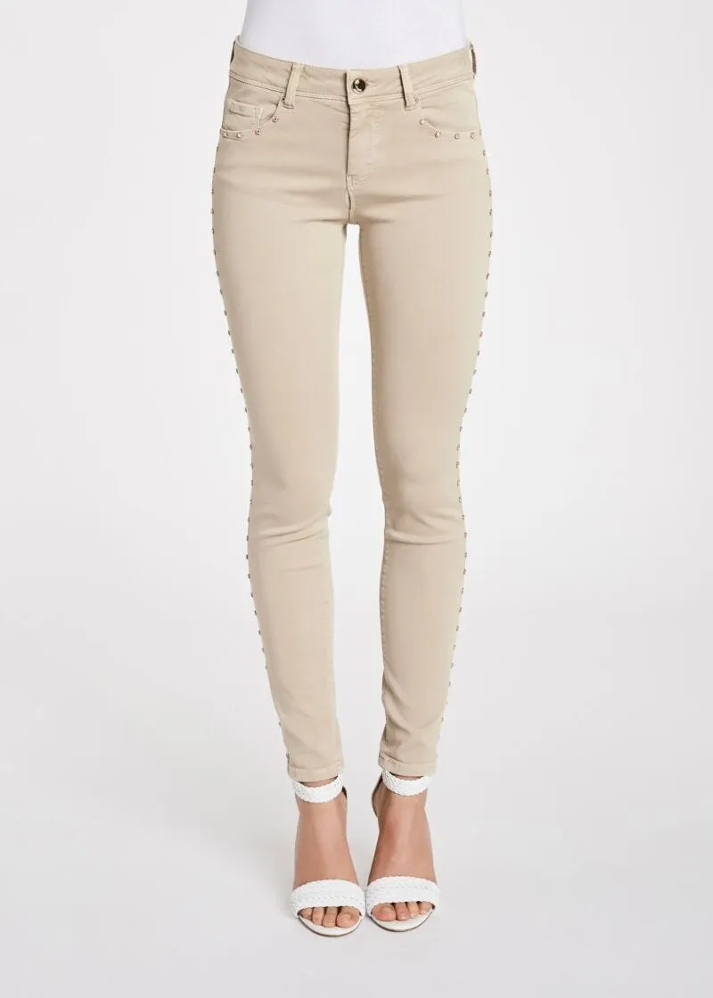 Pantaloni skinny con borchie