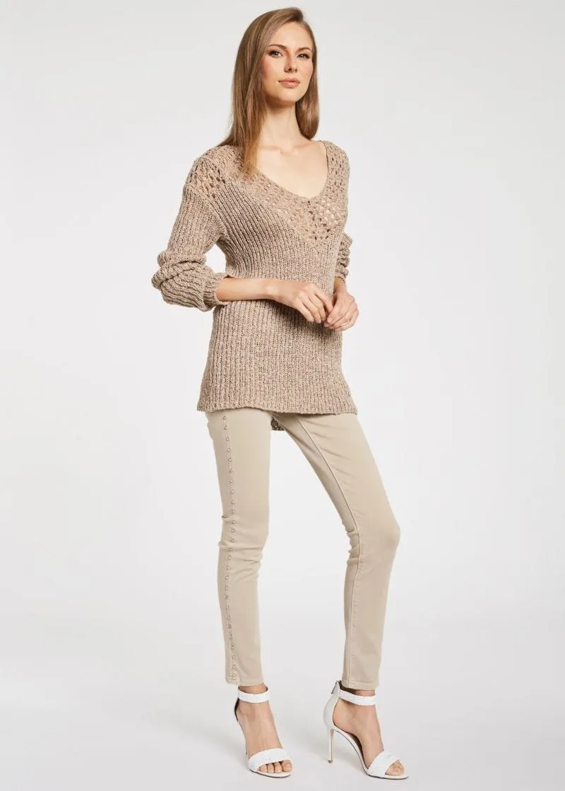 Pantaloni skinny con borchie