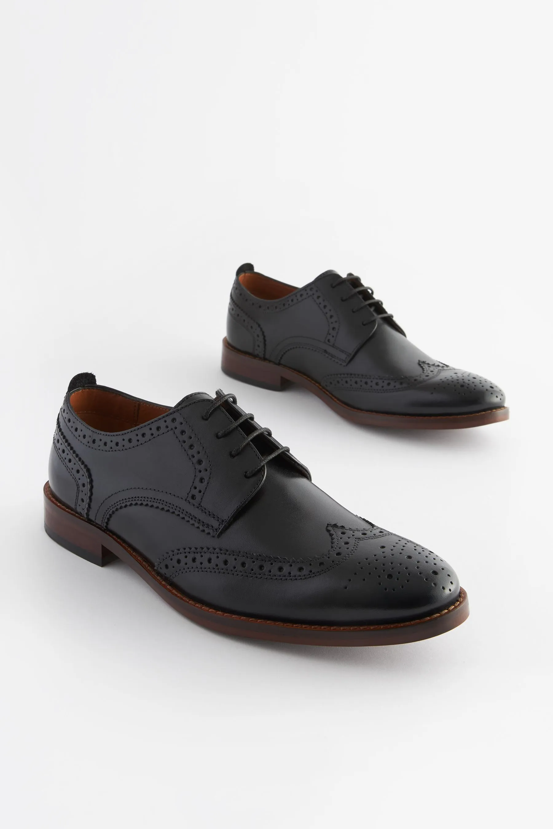 Scarpe brogue in pelle con suola a contrasto    
