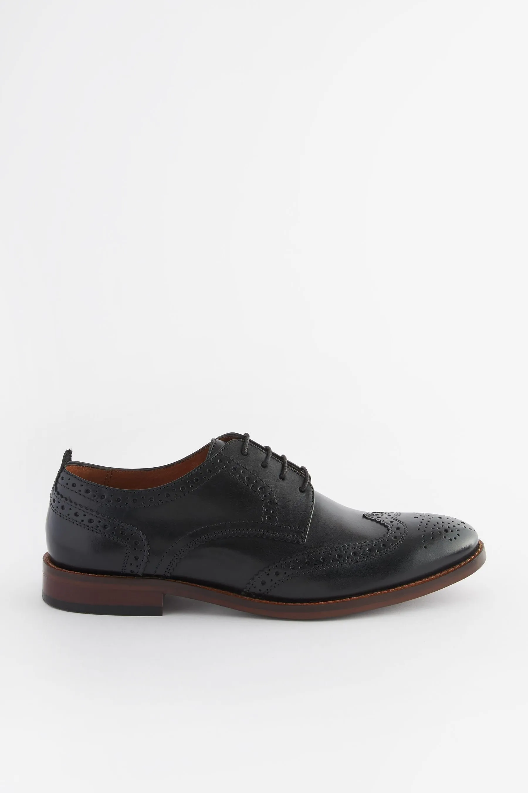 Scarpe brogue in pelle con suola a contrasto    